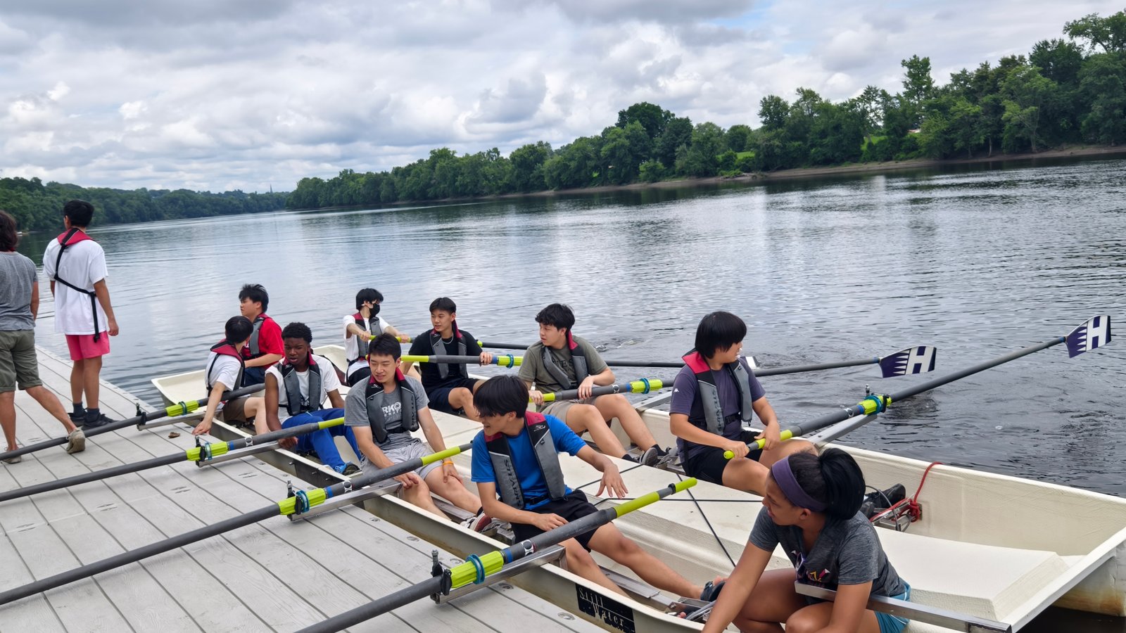 Students rowing on the river